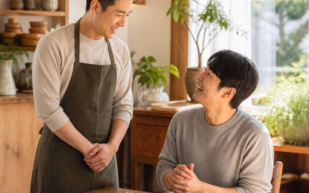 손님과 이야기를 나누며 웃는 사장님